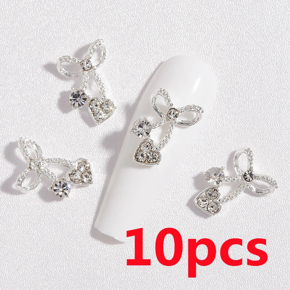 1 Bag Random Luxury Nail Art Dangle Jewelry  (Heart Bowknot)  Mixed Style 3D Nail Art Charms Tassel Design Alloy Nail Art Dangle