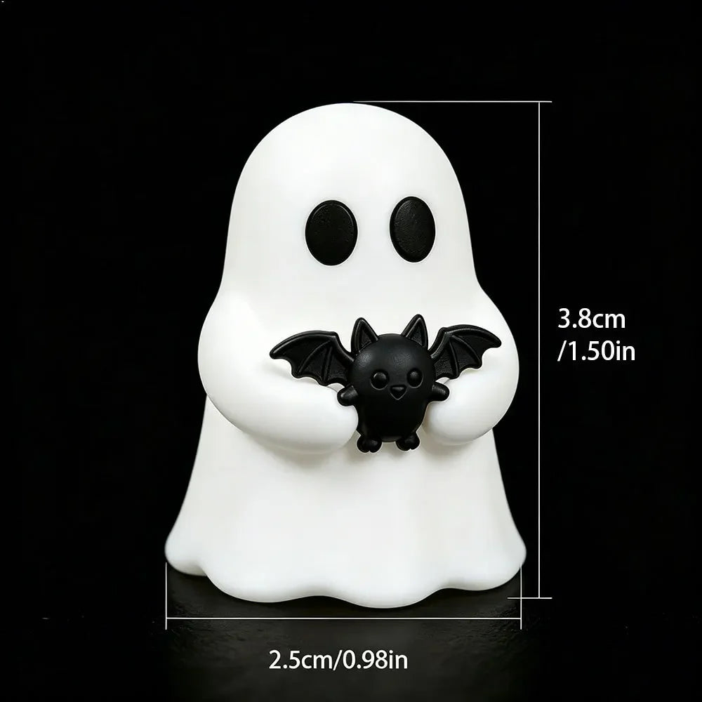 Halloween-themed desktop decoration scene - cute little ghosts, decorative items, mini glowing micro-landscape