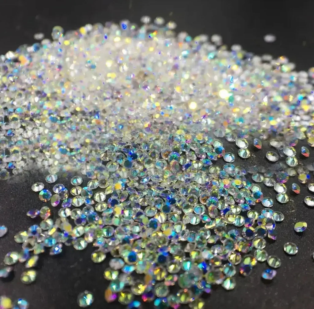 1Bag Aprox.1400Pcs Mini Nail Rhinestones Micro 1.2mm Nail Sand Pixie Crystals Iridescent AB Bling Tiny Sugar Beads Nail Charms *
